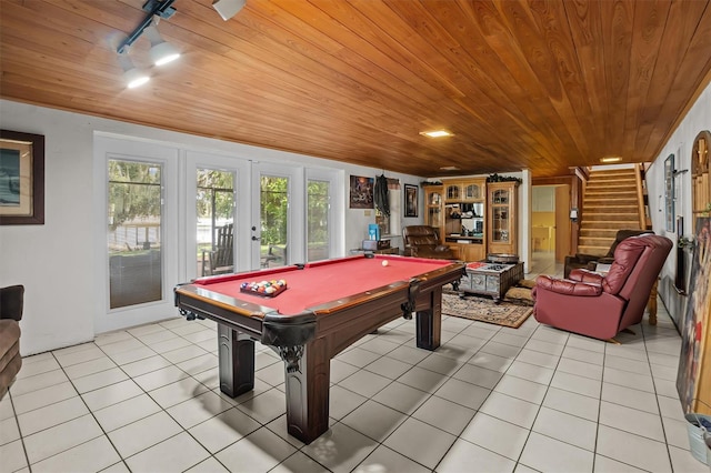 playroom with wood ceiling, pool table, light tile patterned floors, and french doors