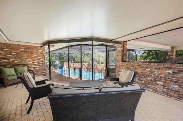 view of patio with a fenced in pool