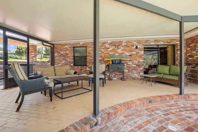 unfurnished sunroom with beamed ceiling