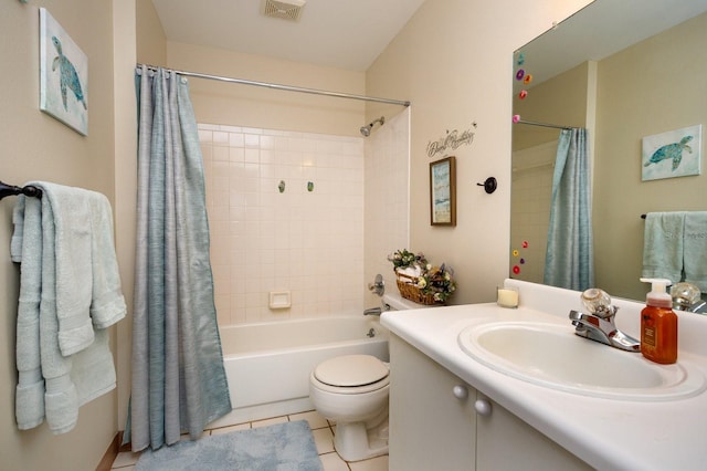 full bathroom featuring tile patterned flooring, vanity, toilet, and shower / tub combo