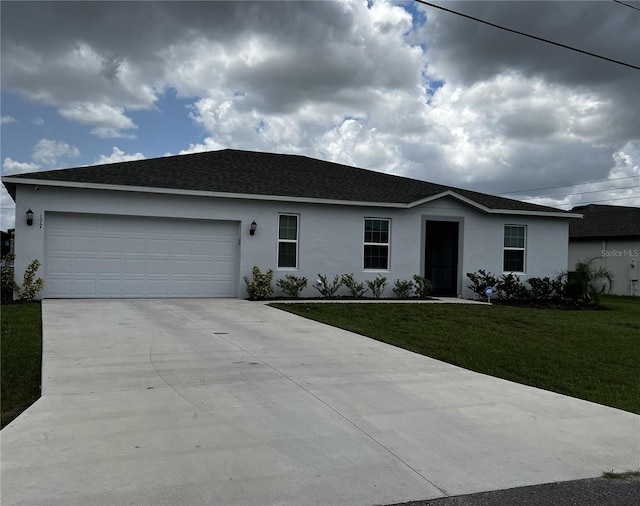 ranch-style home with a garage and a front yard