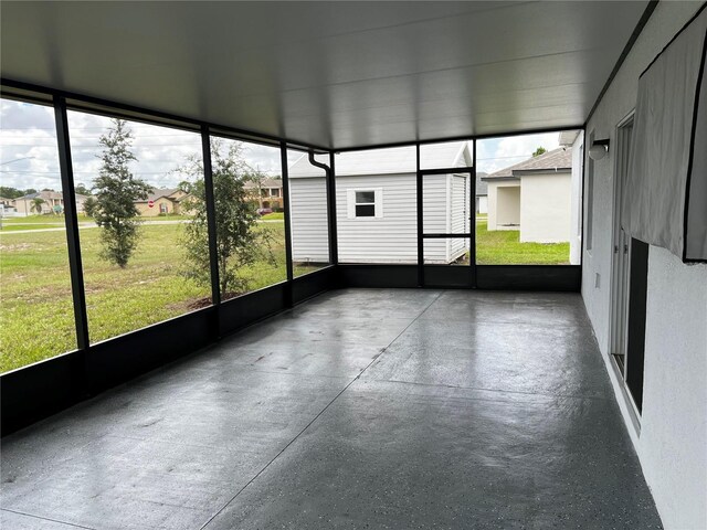 177 Cimarron Ln, Kissimmee, FL 34759 - unfurnished sunroom featuring plenty of natural light