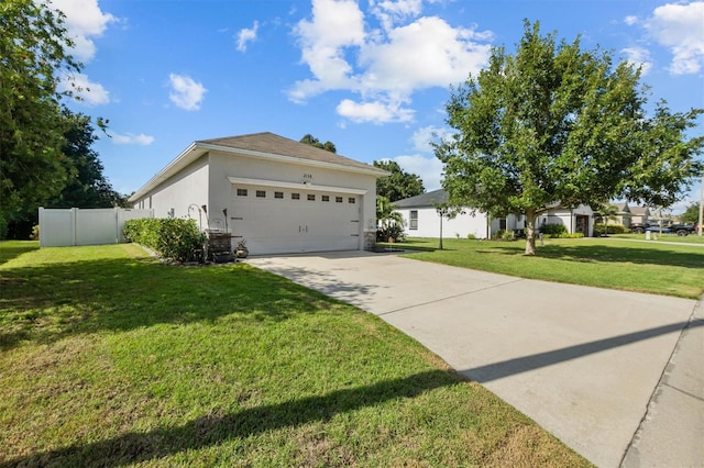 ranch-style house with a front yard and a garage