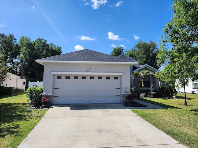 2158 Mirasol Dr, Winter Haven, FL 33881 - ranch-style house featuring stucco siding, a front yard, and driveway