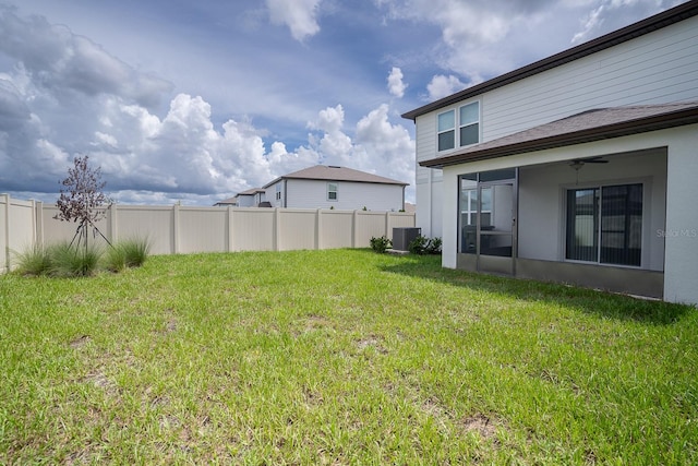 view of yard featuring central AC unit