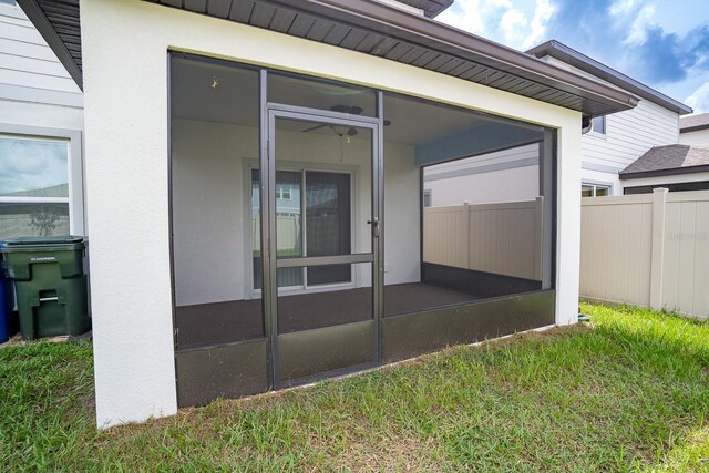 exterior space featuring a sunroom