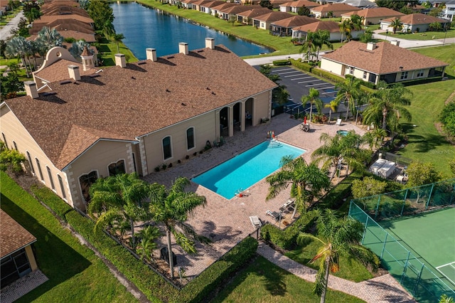 birds eye view of property featuring a water view