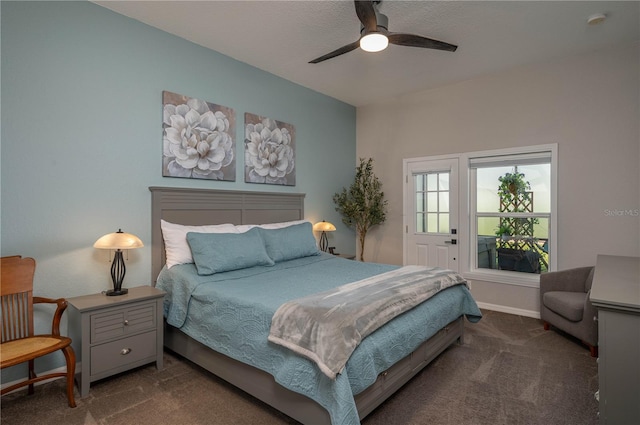 bedroom with dark carpet and ceiling fan