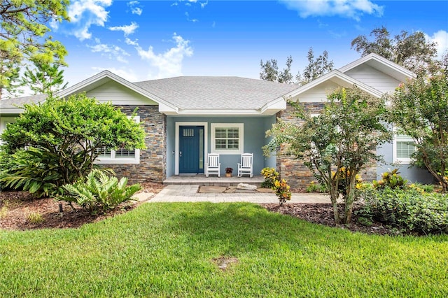 view of front of home with a front lawn