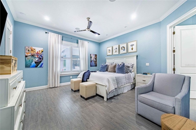 bedroom with crown molding, light hardwood / wood-style flooring, and ceiling fan