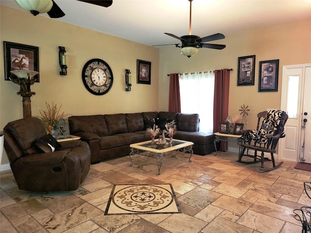 living room with ceiling fan and a wealth of natural light