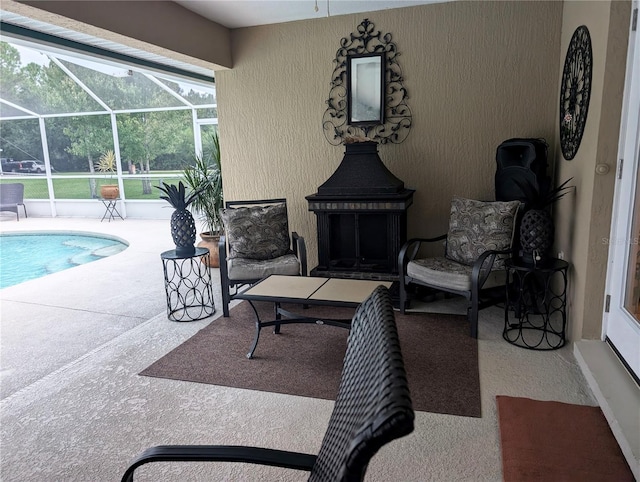 view of patio / terrace featuring glass enclosure