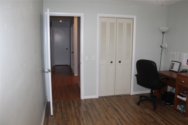 office space featuring dark wood-type flooring