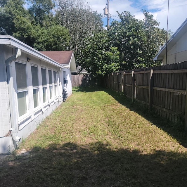 view of yard featuring a fenced backyard