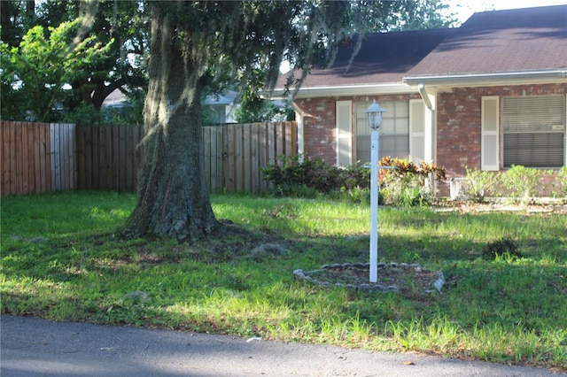 view of yard featuring fence