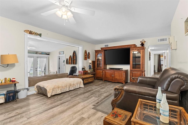 bedroom featuring light hardwood / wood-style flooring and ceiling fan