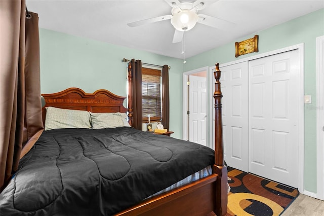 bedroom with a closet, ceiling fan, and light hardwood / wood-style floors