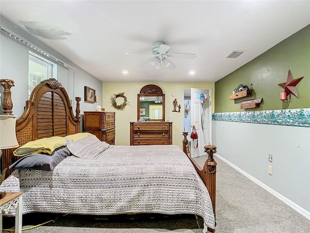 carpeted bedroom with ceiling fan