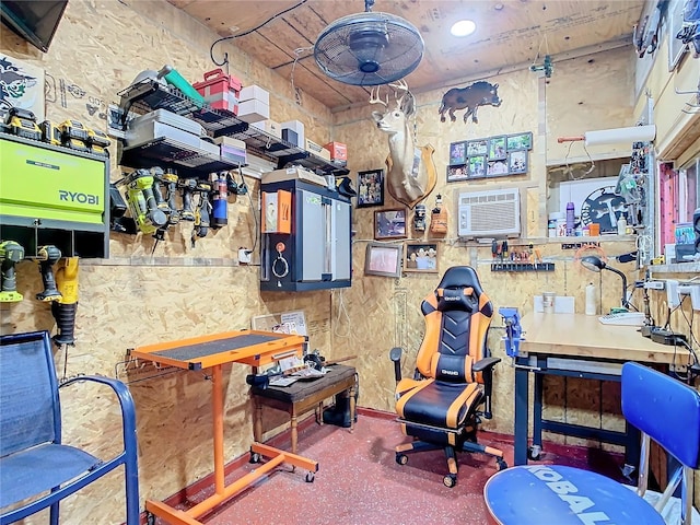 miscellaneous room featuring a workshop area