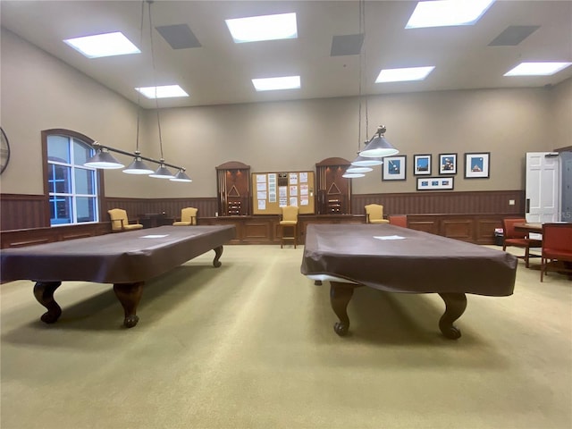 rec room with carpet flooring, pool table, and a high ceiling