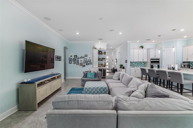 tiled living room with ornamental molding