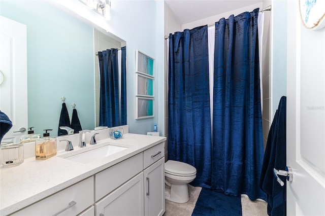 bathroom with vanity, toilet, a shower with shower curtain, and tile patterned flooring