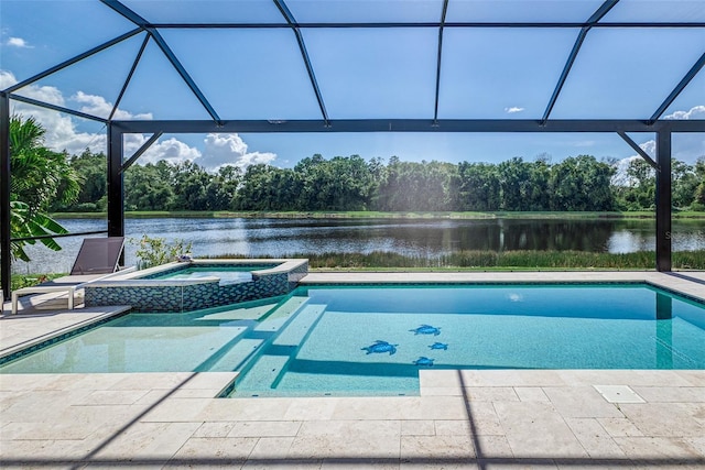 view of swimming pool featuring glass enclosure, a water view, and an in ground hot tub