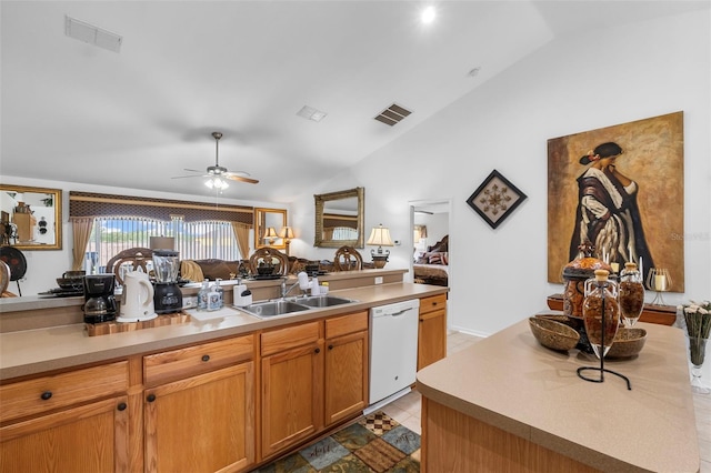 kitchen with dishwasher, a center island, sink, lofted ceiling, and ceiling fan