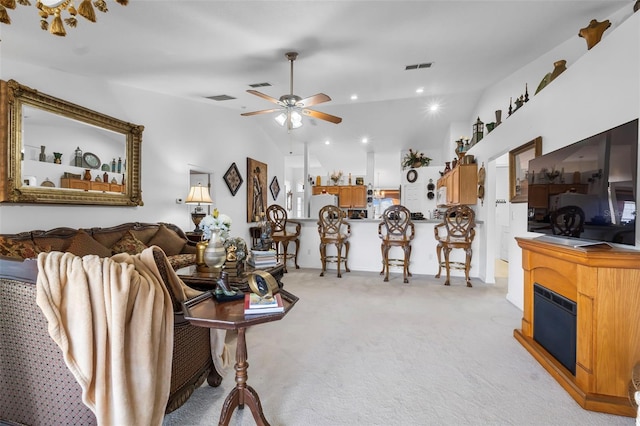 living room featuring ceiling fan and light carpet