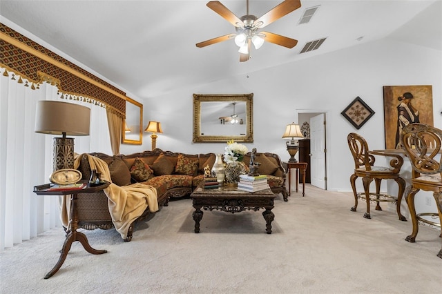 carpeted living room featuring lofted ceiling and ceiling fan