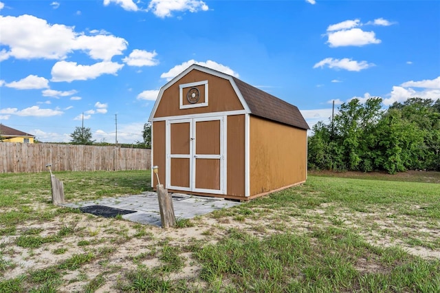 view of outdoor structure with a yard