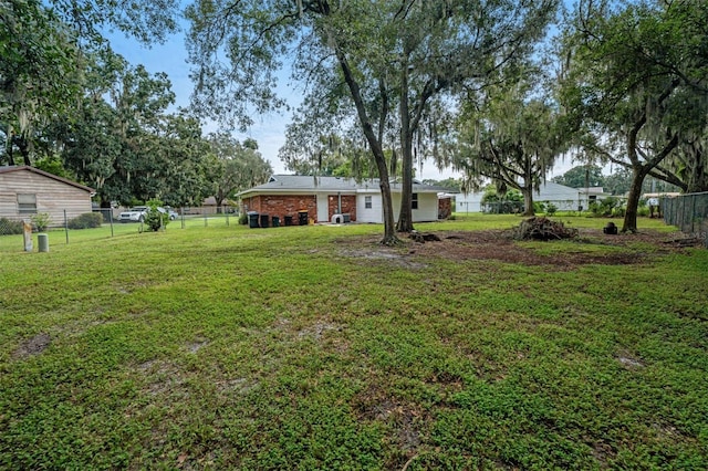 view of yard with fence