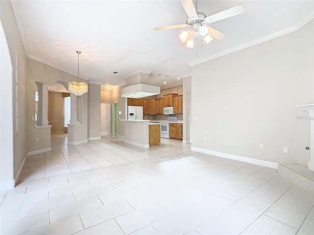 kitchen featuring open floor plan, light countertops, ornamental molding, brown cabinetry, and white appliances