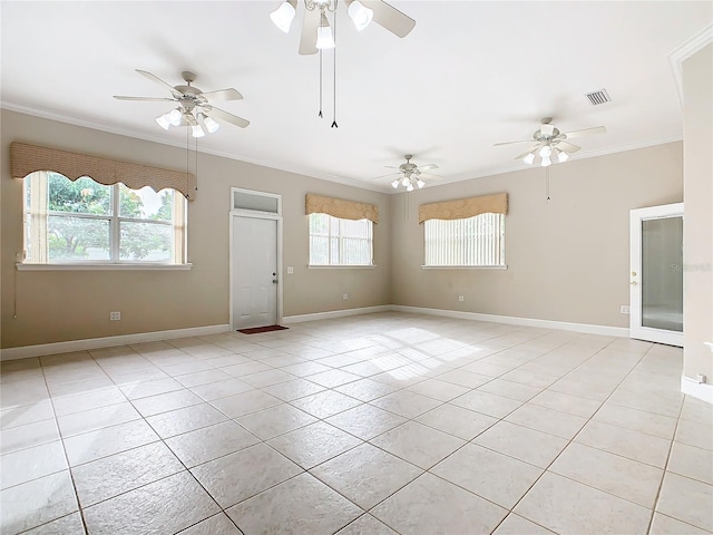 unfurnished room featuring light tile patterned floors, a healthy amount of sunlight, visible vents, and ornamental molding