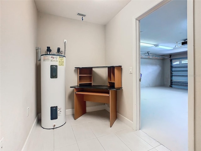 interior space with water heater and a garage