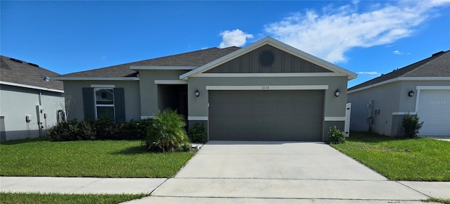 view of front of property featuring a garage and a front yard