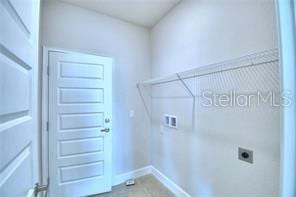 laundry area with washer hookup and electric dryer hookup