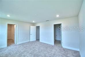 unfurnished bedroom featuring carpet floors