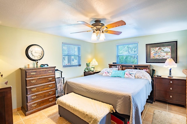 4822 Melody Ln, Lakeland, FL 33805 - bedroom featuring multiple windows, light tile patterned floors, and ceiling fan