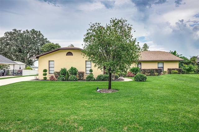 view of front of property with a front lawn