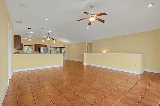 unfurnished living room featuring lofted ceiling, ceiling fan, and light tile patterned floors