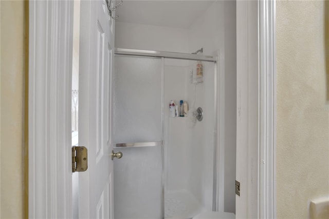 bathroom with an enclosed shower