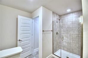 bathroom featuring walk in shower