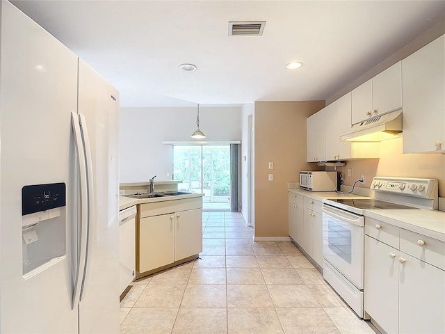 kitchen with white cabinetry, white appliances, light tile patterned floors, pendant lighting, and sink