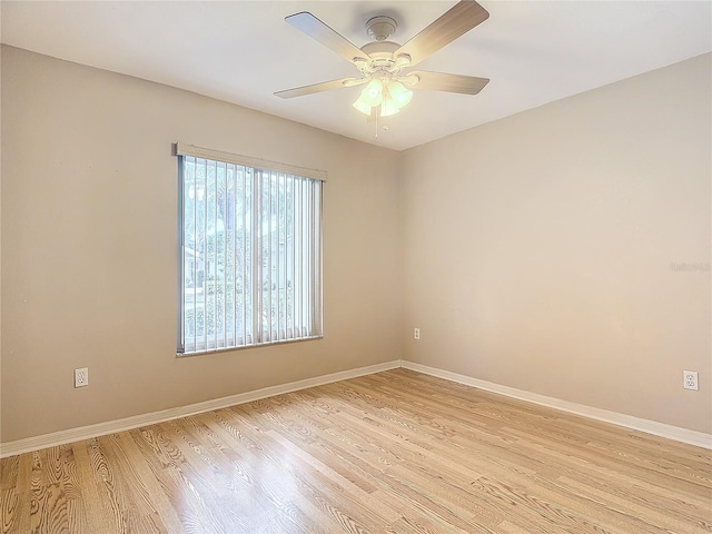 unfurnished room featuring ceiling fan and light hardwood / wood-style flooring