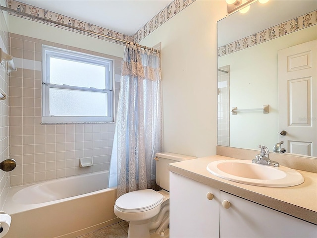 full bathroom with shower / tub combo with curtain, tile patterned flooring, vanity, and toilet