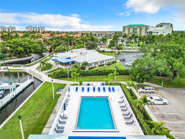 view of pool featuring a water view