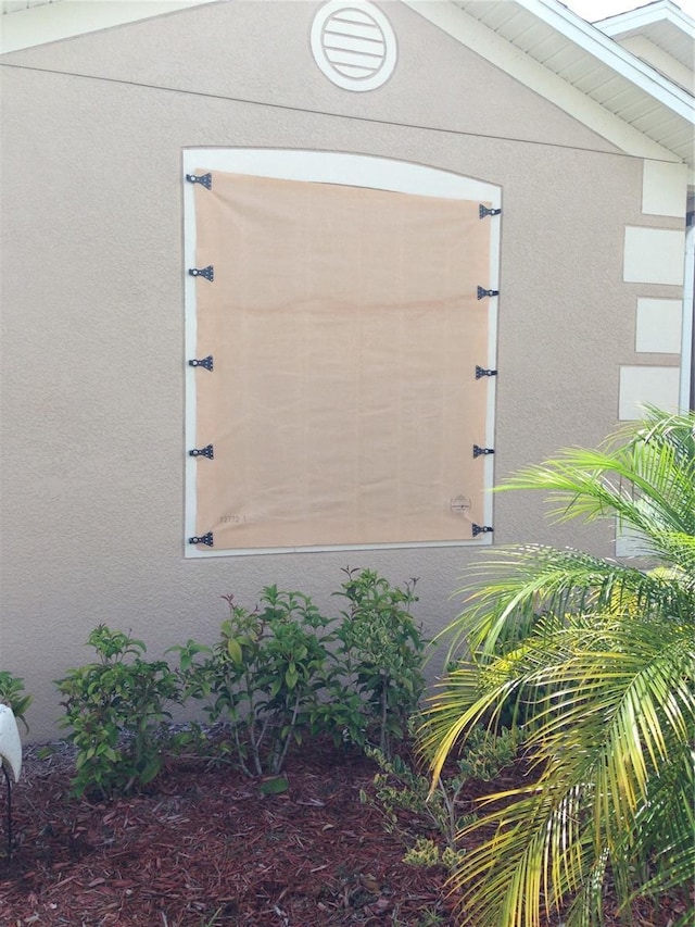 exterior space featuring stucco siding