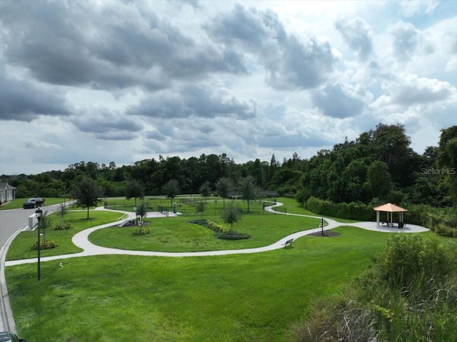 view of home's community featuring a lawn and a gazebo