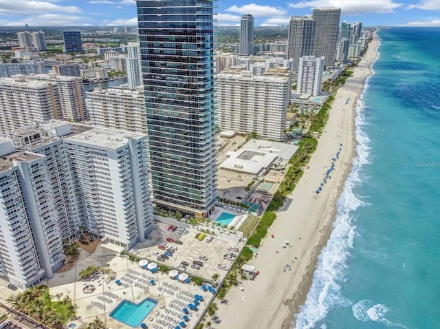 aerial view featuring a water view and a view of the beach